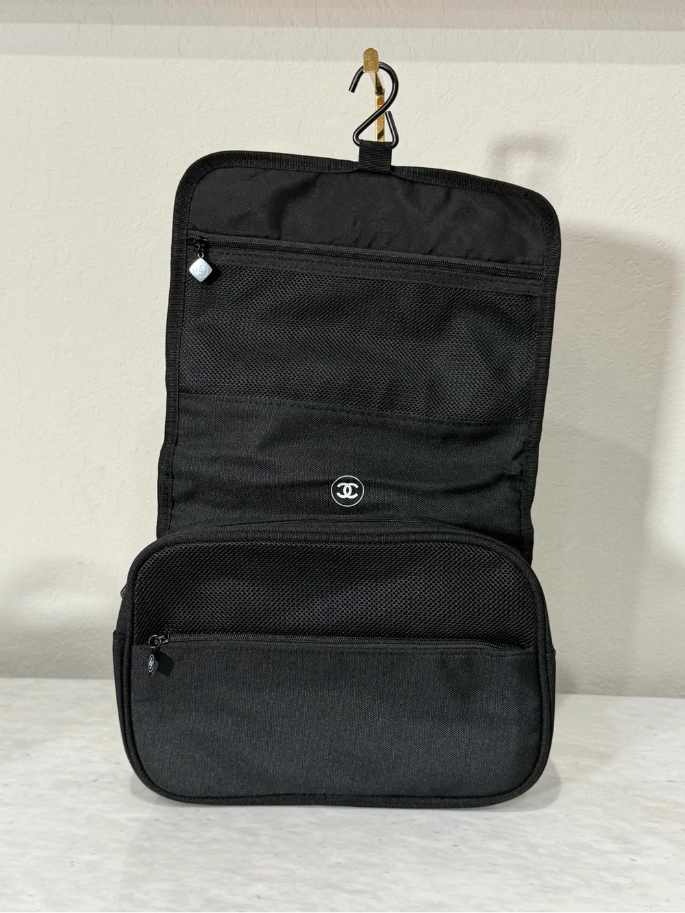 CHANEL Black Toiletry Pouch with White Logo